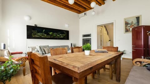 Superior Duplex, River View | Living area | 50-inch LCD TV with cable channels