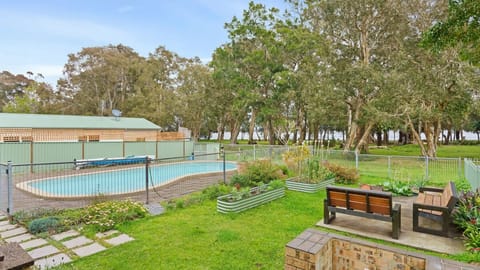 Poolside bliss meets backyard serene.