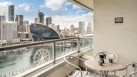 Enjoy breathtaking waterfront views and the vibrant city skyline from your private balcony.