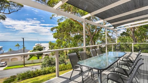 Relax and unwind with panoramic ocean views from the sun-drenched deck.