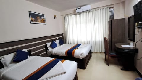 Premium bedding, memory foam beds, laptop workspace, free WiFi