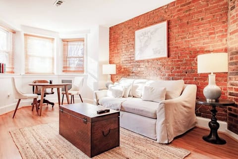 Comfortable living room with couch and table in DC