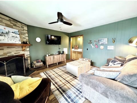 Cozy cabin like decor with sleeper sofa
