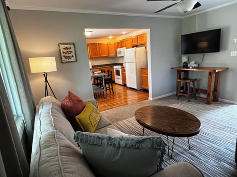 Living room with pull-out queen-sized couch. Lots of board games and maps.