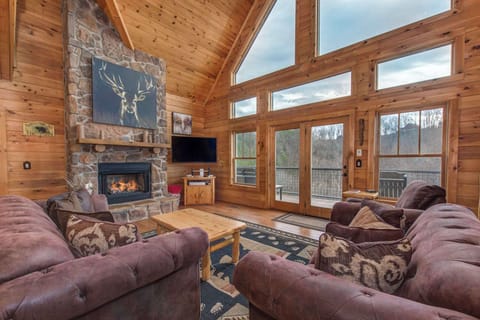 Curl up in the living room & stream your favorites by the seasonal fireplace