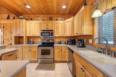 The welcoming kitchen offers ample space & all the comforts of home