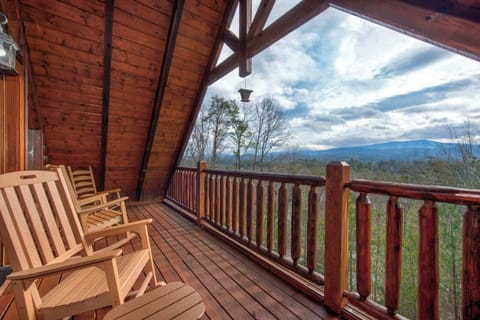 Lounge the day away with treehouse-like views on the upper-level balcony