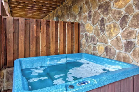 Relax and unwind in the private hot tub