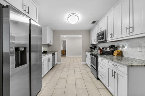 Featuring tons of cabinetry and a large fridge