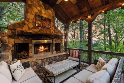 Discover tranquility in our cabin's outdoor lounge, where the natural beauty and fresh air create a perfect escape