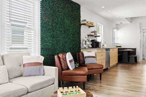 Living Room: Cozy comfort meets modern style — unwind in this bright and inviting Airbnb living room, perfect for relaxing after a day of exploring.