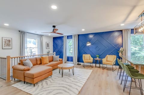 Step into comfort: Our spacious living room and open-concept kitchen!