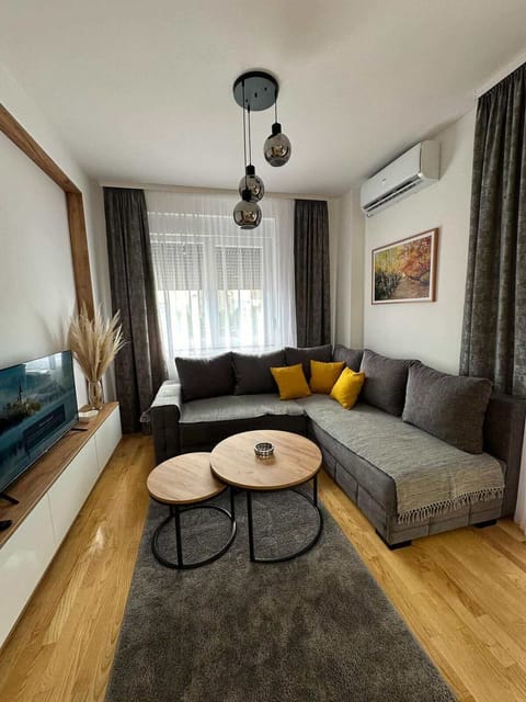 Comfort Apartment, Balcony | Living area | Flat-screen TV