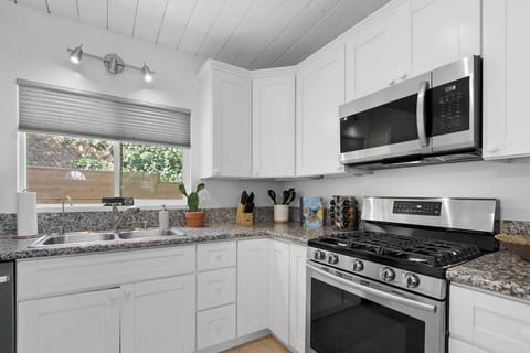 Prepare a feast or a quick snack in our functional kitchen space.