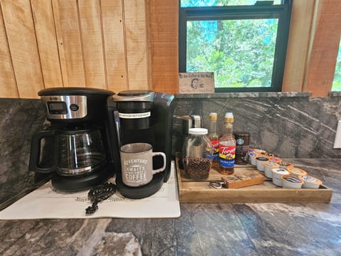 We have a drip and Keurig coffee machine available. We also supply an assortment of different types of Kcups, flavorings, sugar, creamer, coffee grounds, and coffee beans (with a grinder) for those coffee lovers who would like to make a fresh cup!!