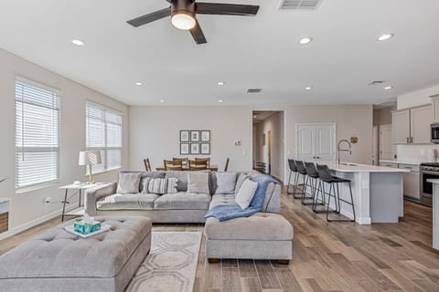pacious open-concept living area with cozy seating and modern finishes – perfect for relaxing and entertaining!