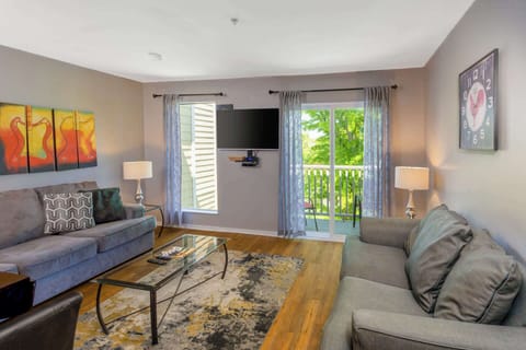 Livingroom with ample seating and TV