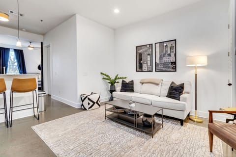 Unwind in the living area on plush sofas