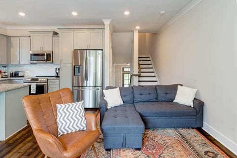 Cozy and spacious living area with TV