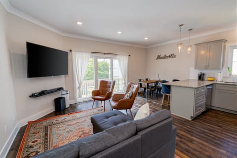 Living, dining, and kitchen area