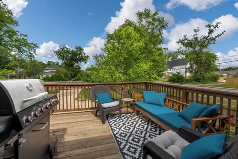 Patio with outdoor seating and gas BBQ grill