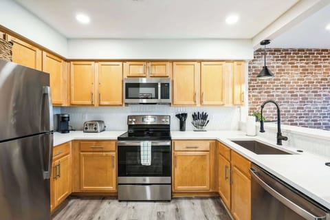 The kitchen is spacious & offers all the comforts of home