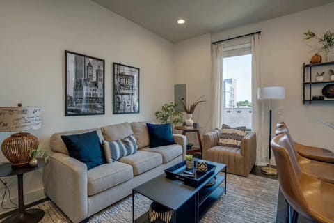 Living area with Queen sofa sleeper and Smart TV