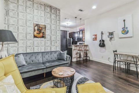 Living room with full futon, and Smart TV
