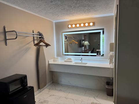 Deluxe Double Room, 2 Queen Beds, Refrigerator & Microwave | Bathroom sink