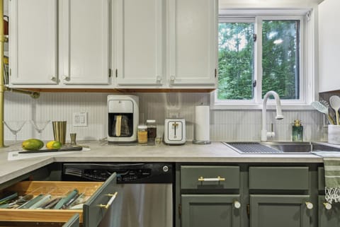 Stocked with cutlery, utensils, drinkware, barware, coffee maker, toaster & more