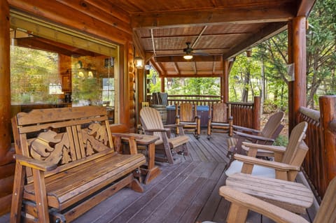 Plenty of outdoor seating on this porch