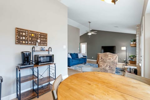 Gather for meals together around the dining table, with seating for 4