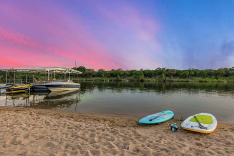Soak in the sunshine lakeside on your very own private beach