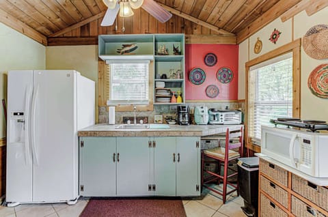The charming kitchen area offers ample space & all the comforts of home
