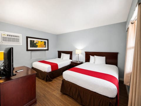 Room, 2 Queen Beds, Non Smoking | In-room safe, iron/ironing board, free WiFi, bed sheets