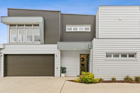 🏡 Modern home façade with garage and private entrance