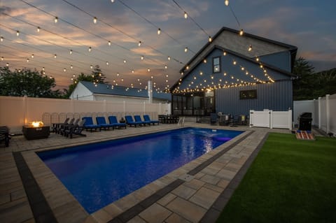 Welcome to 19775 Duffy Street! Stunning Home with Private Pool, Porch, Firepit, Game Room, Two Kitchens, and Three Family Rooms- Sleeps 26