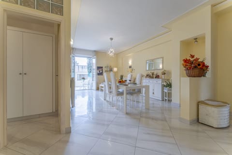 Apartment | Living area | 32-inch flat-screen TV with cable channels