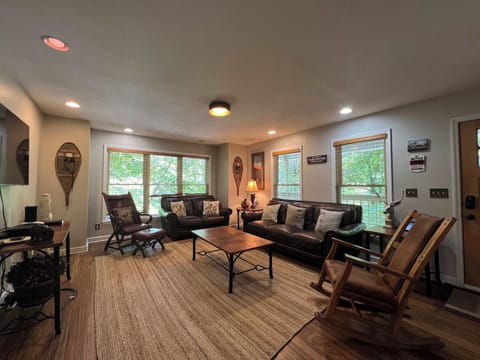 Curl up in the tranquil living room & enjoy a movie night at home