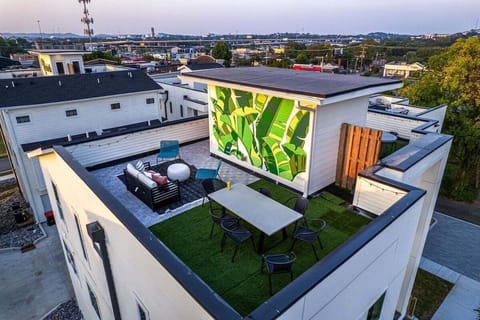 Unit 232: Private rooftop deck with seating and photo op