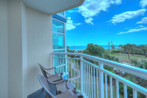 Sit down with a cup of coffee while watching the waves.