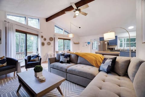 Modern comfort with a touch of rustic style - this living room sofa is the perfect place to unwind with a throw blanket!