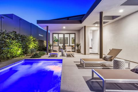 Private pool and spa at sunset in a secluded backyard