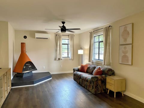 Cozy living room with electric fireplace. 