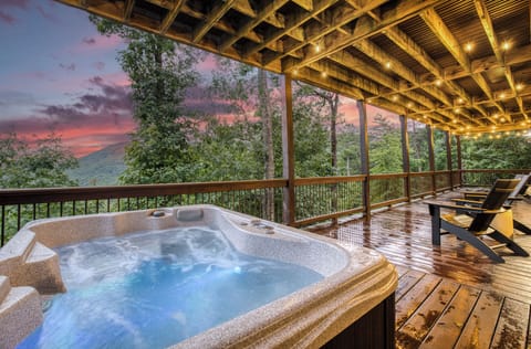 Hot tub on lower deck with beautiful views of the mountains