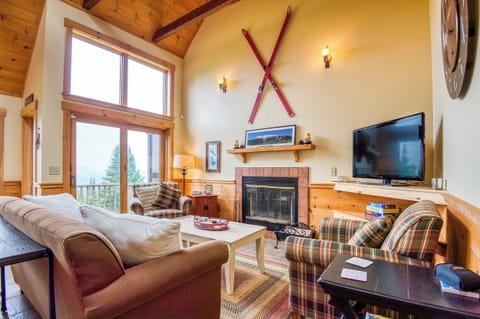 Living room with fireplace and smart tv