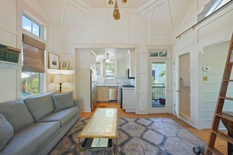 OPEN LIVING WITH SLEEPER SOFA AND BONUS LOFT UP SHIPS LADDER