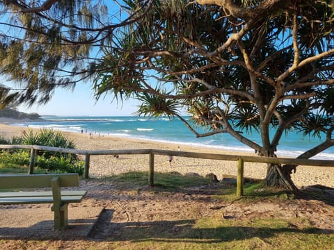 Nearby family and pet friendly Moffat Beach.