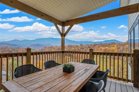 Patio on main level with dining table