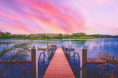 Indulge yourself with waterfront lake access & million dollar views...